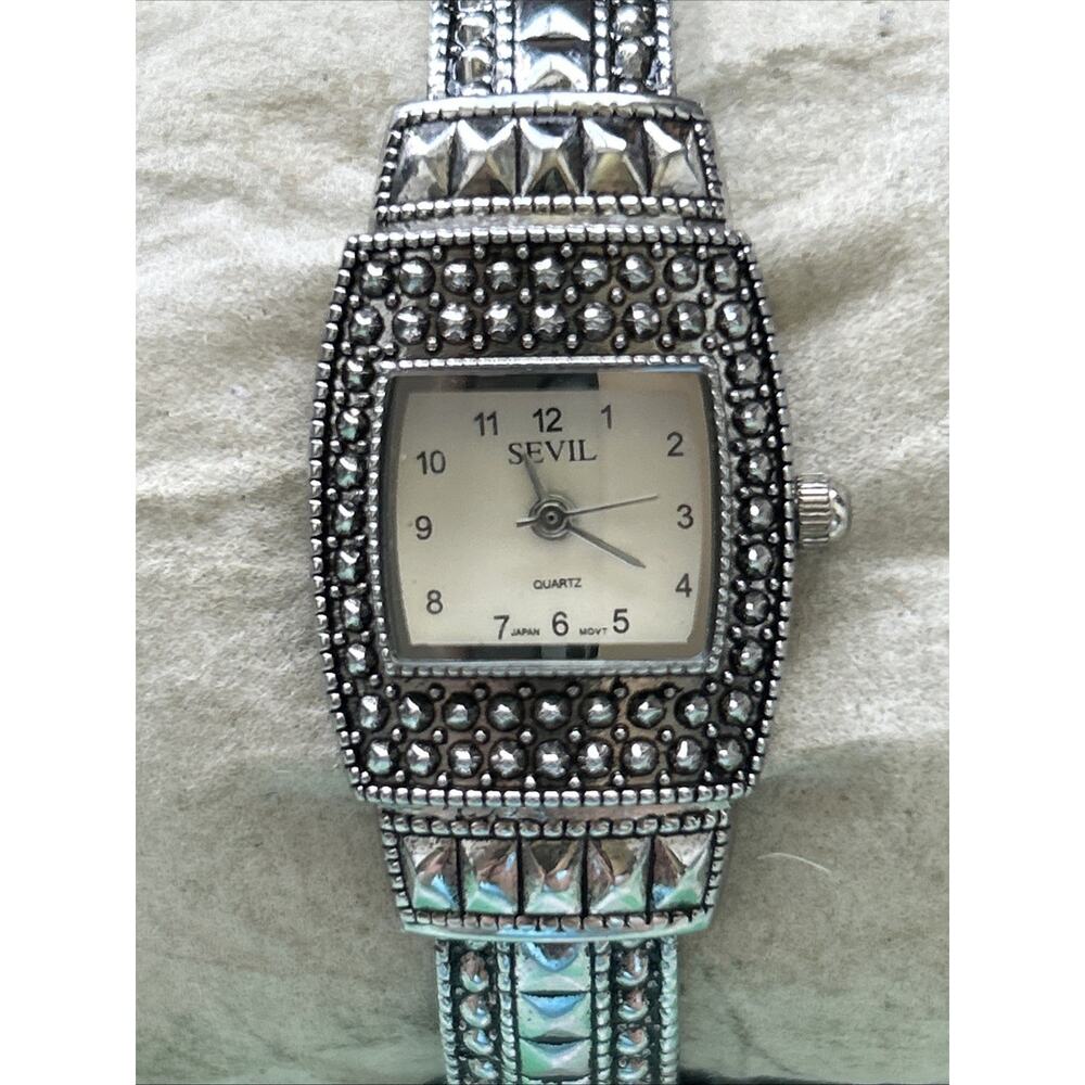 Sevil Silver Tone Women’s Cuff Watch
